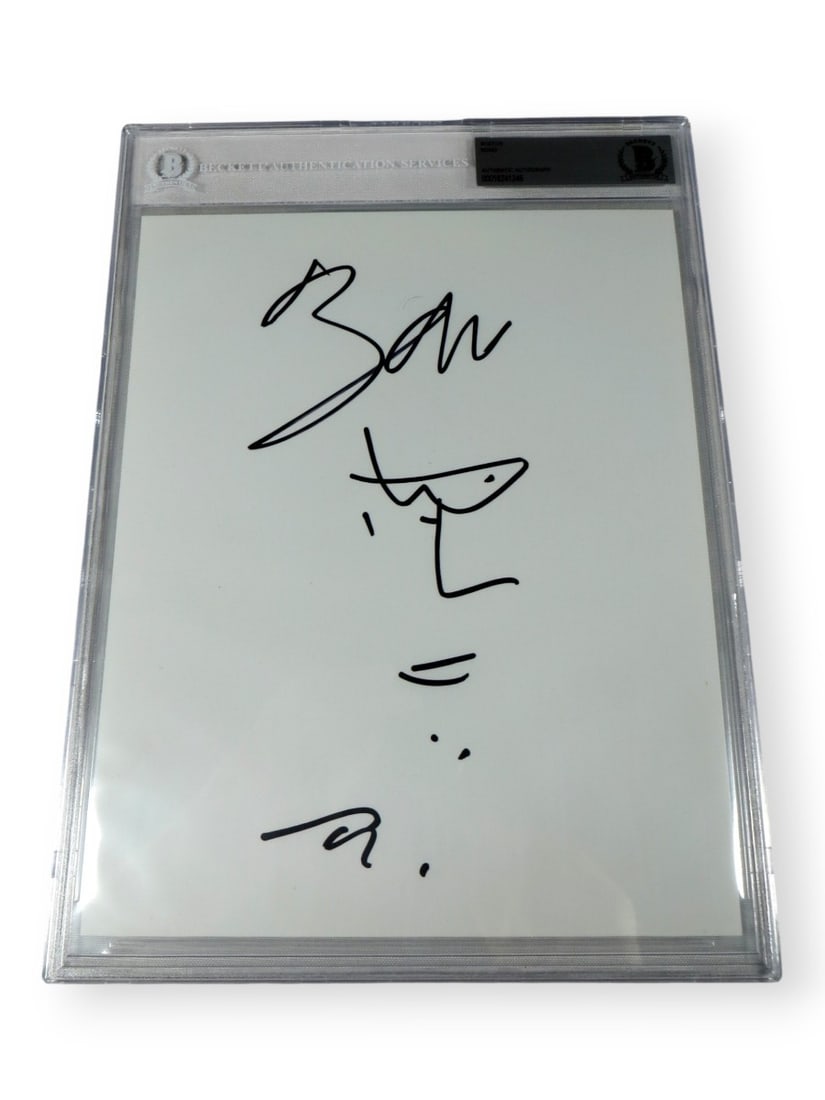 Bono Autographed Sketch Drawing U2 Beckett Authenticated 9 x 12: Bono Autographed Sketch Drawing U2 Beckett Authenticated 9 x 12 This is an original autographed sketch drawing by Bono, the iconic singer of U2. The piece is authenticated by Beckett Authentication Se