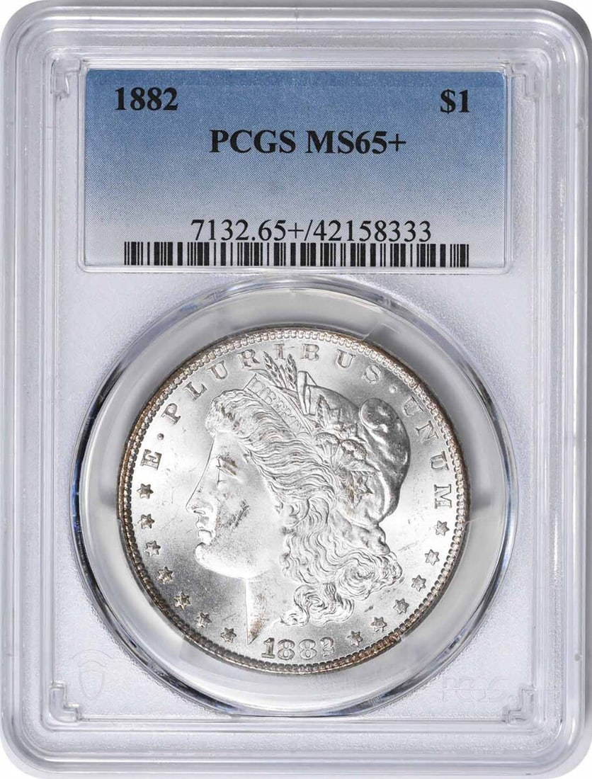 1882 Morgan Silver Dollar MS65 PCGS Uncirculated 90% Silver: 1882 Morgan Silver Dollar MS65 PCGS Uncirculated 90% Silver This 1882 Morgan Silver Dollar is an exquisite piece featuring a high grade of MS65+, certified by PCGS. Struck in 90% silver and 10% copper