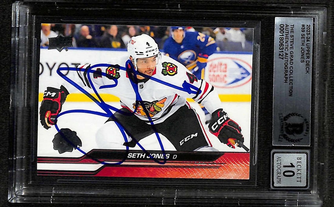 Seth Jones 2023-24 Upper Deck #39 Autographed Card Beckett 10 Blackhawks: Seth Jones 2023-24 Upper Deck #39 Autographed Card Beckett 10 Blackhawks Own a premium piece of NHL memorabilia with this Seth Jones 2023-24 Upper Deck #39 autographed hockey card, featuring the star