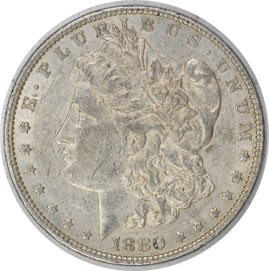 1880-O Morgan Silver Dollar AU Uncertified 90% Silver Coin: 1880-O Morgan Silver Dollar AU Uncertified 90% Silver Coin This 1880-O Morgan Silver Dollar is a beautiful example of American coinage. It features a composition of 90% silver and 10% copper, showcasi