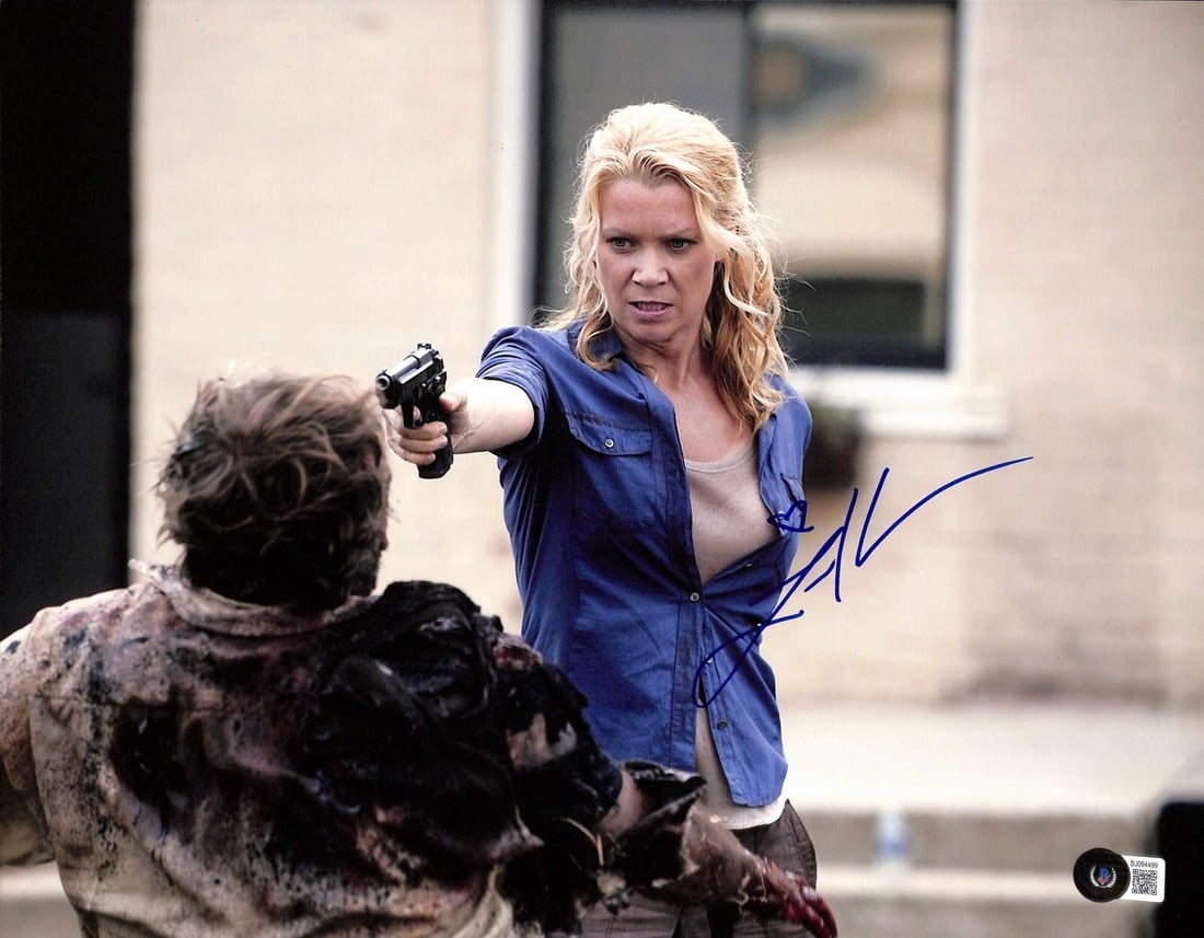 Laurie Holden Autographed 11x14 Photo Andrea Character Beckett Certified: Laurie Holden Autographed 11x14 Photo Andrea Character Beckett Certified This is an original 11x14 autographed photograph signed by Laurie Holden, who portrayed Andrea in the TV series The Walking Dea
