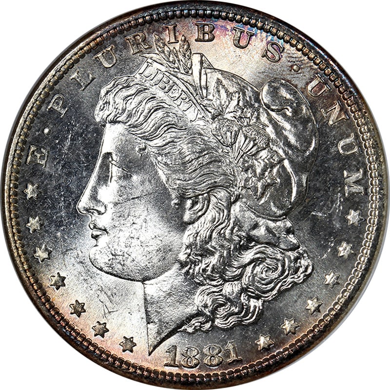 1881-S Morgan Silver Dollar NGC MS65 Stunning Toning Superb Eye Appeal: 1881-S Morgan Silver Dollar NGC MS65 Stunning Toning Superb Eye Appeal This stunning 1881-S Morgan Silver Dollar, certified by NGC with a grade of MS65, showcases superb eye appeal characterized by it