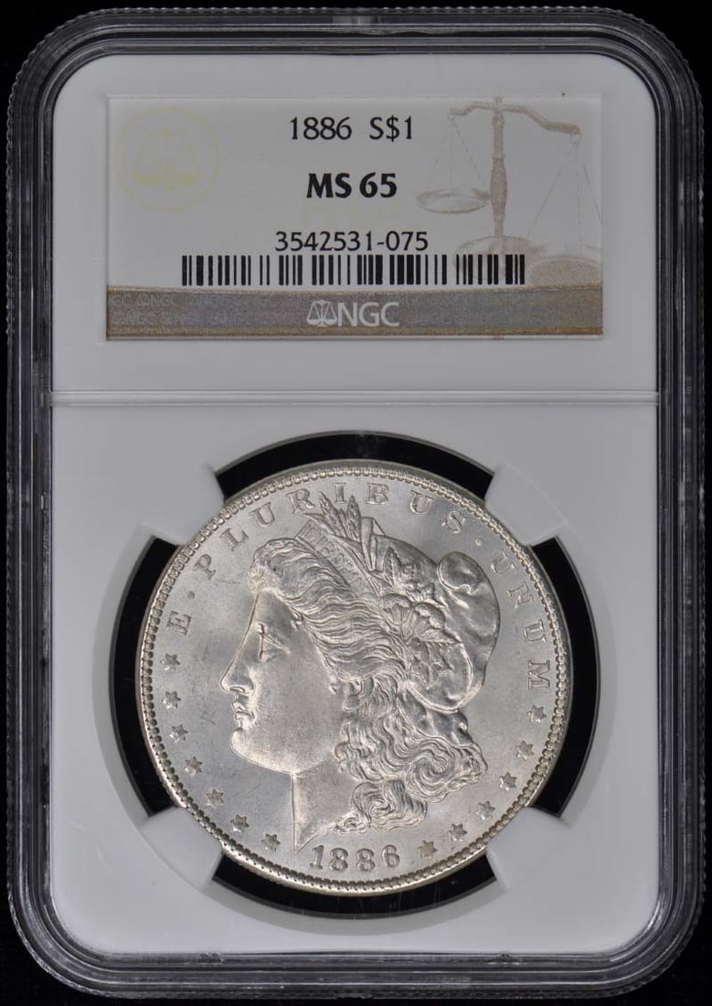 1886 Morgan Dollar NGC MS65 Uncirculated Philadelphia Mint: 1886 Morgan Dollar NGC MS65 Uncirculated Philadelphia Mint This 1886 Morgan Dollar is a stunning example of U.S. coinage, certified by NGC with a grade of MS65, indicating its uncirculated condition.