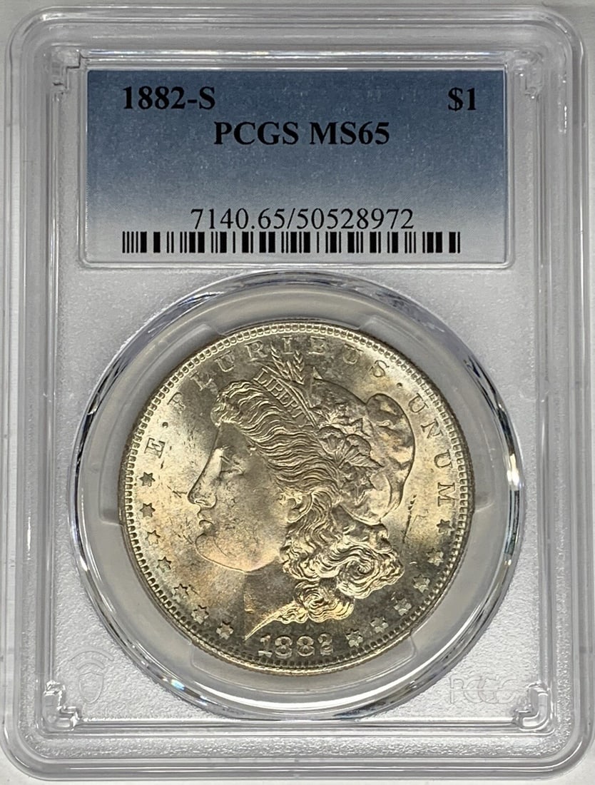 PCGS Certified 1882-S Morgan Dollar Silver Coin MS 65 Grade: PCGS Certified 1882-S Morgan Dollar Silver Coin MS 65 Grade This 1882-S Morgan Silver Dollar is certified by PCGS with a grade of MS 65, indicating an uncirculated, high-quality coin. Minted in the Un