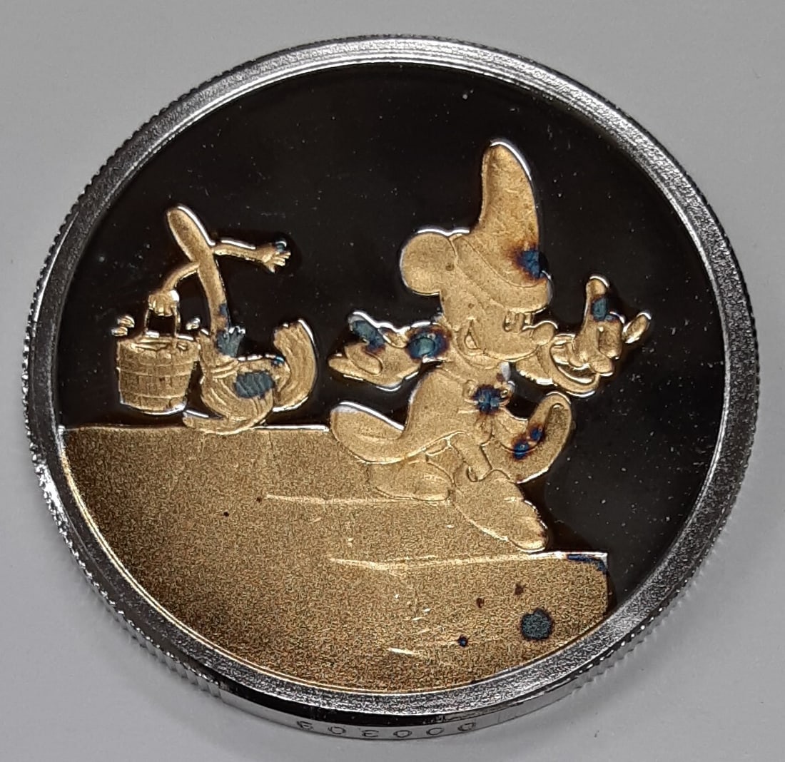 1oz Silver Sorcerer Round 50th Anniversary Disney Fantasia Rarities Mint 1990: 1oz Silver Sorcerer Round 50th Anniversary Disney Fantasia Rarities Mint 1990 This 1oz .999 fine silver round was struck by Rarities Mint to commemorate the 50th anniversary of Walt Disney's movie Fan