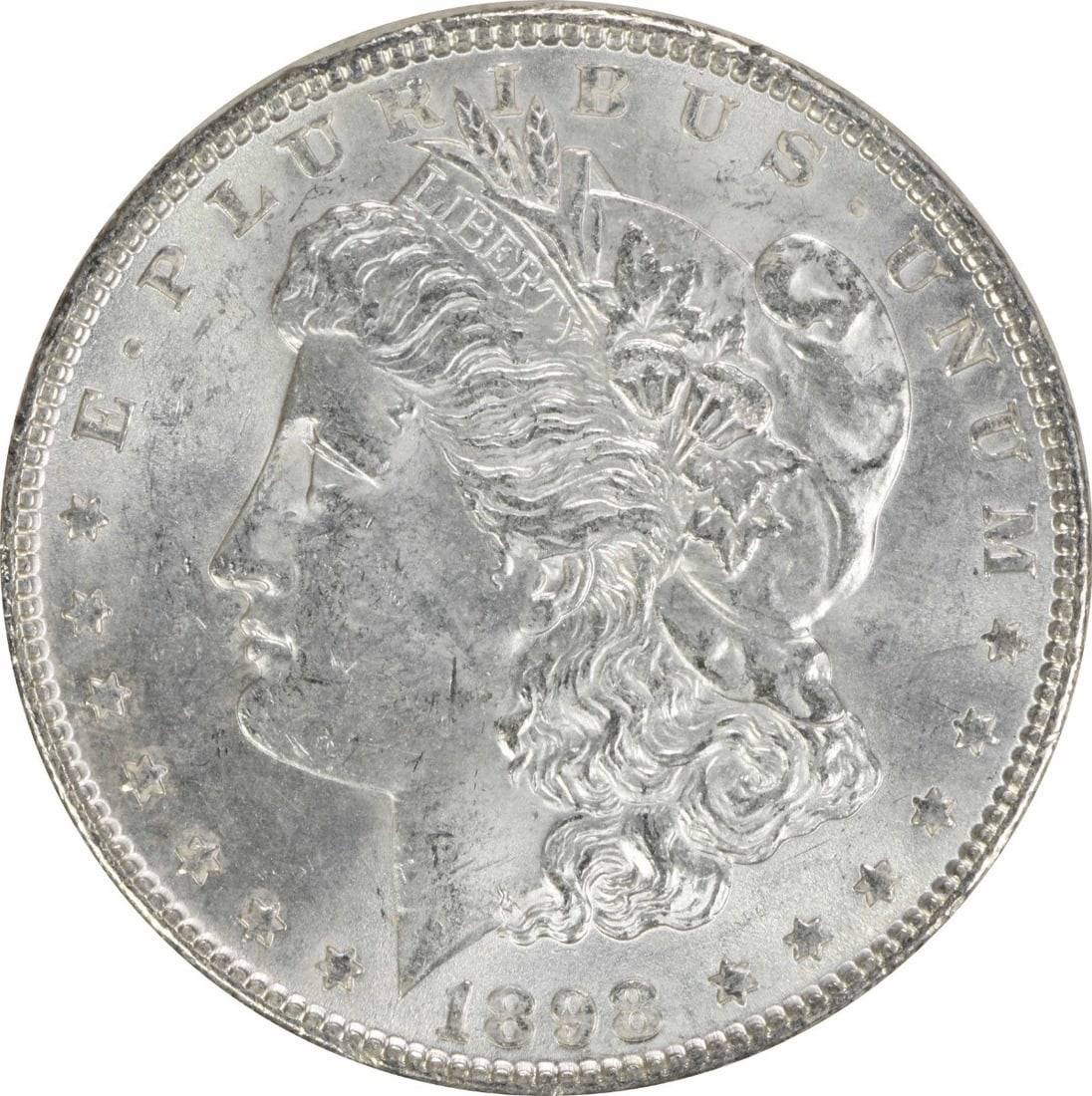 1898 Morgan Silver Dollar Choice Brilliant Uncirculated Uncertified: 1898 Morgan Silver Dollar Choice Brilliant Uncirculated Uncertified This 1898 Morgan Silver Dollar is an uncirculated coin in Choice BU condition, featuring a striking silver composition. It was minte