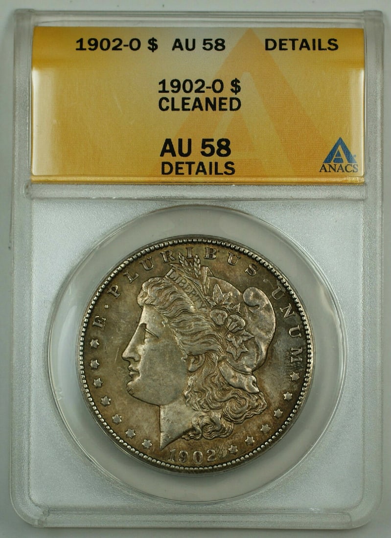 ANACS AU-58 Morgan Dollar 1902-O Silver $1 Coin Cleaned With Toning: ANACS AU-58 Morgan Dollar 1902-O Silver $1 Coin Cleaned With Toning This 1902-O Morgan Silver Dollar coin was minted in New Orleans and certified by ANACS with an AU-58 Details grade. The coin is comp