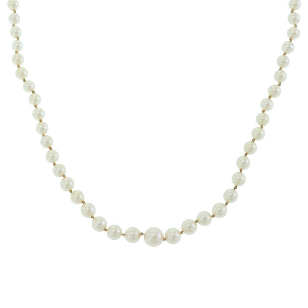 Mikimoto Akoya Pearl Necklace Silver Clasp Graduated 21.5 Inch: Mikimoto Akoya Pearl Necklace Silver Clasp Graduated 21.5 Inch This exquisite vintage single strand necklace features lustrous Akoya pearls in a rich cream color. The design showcases graduated sizes,