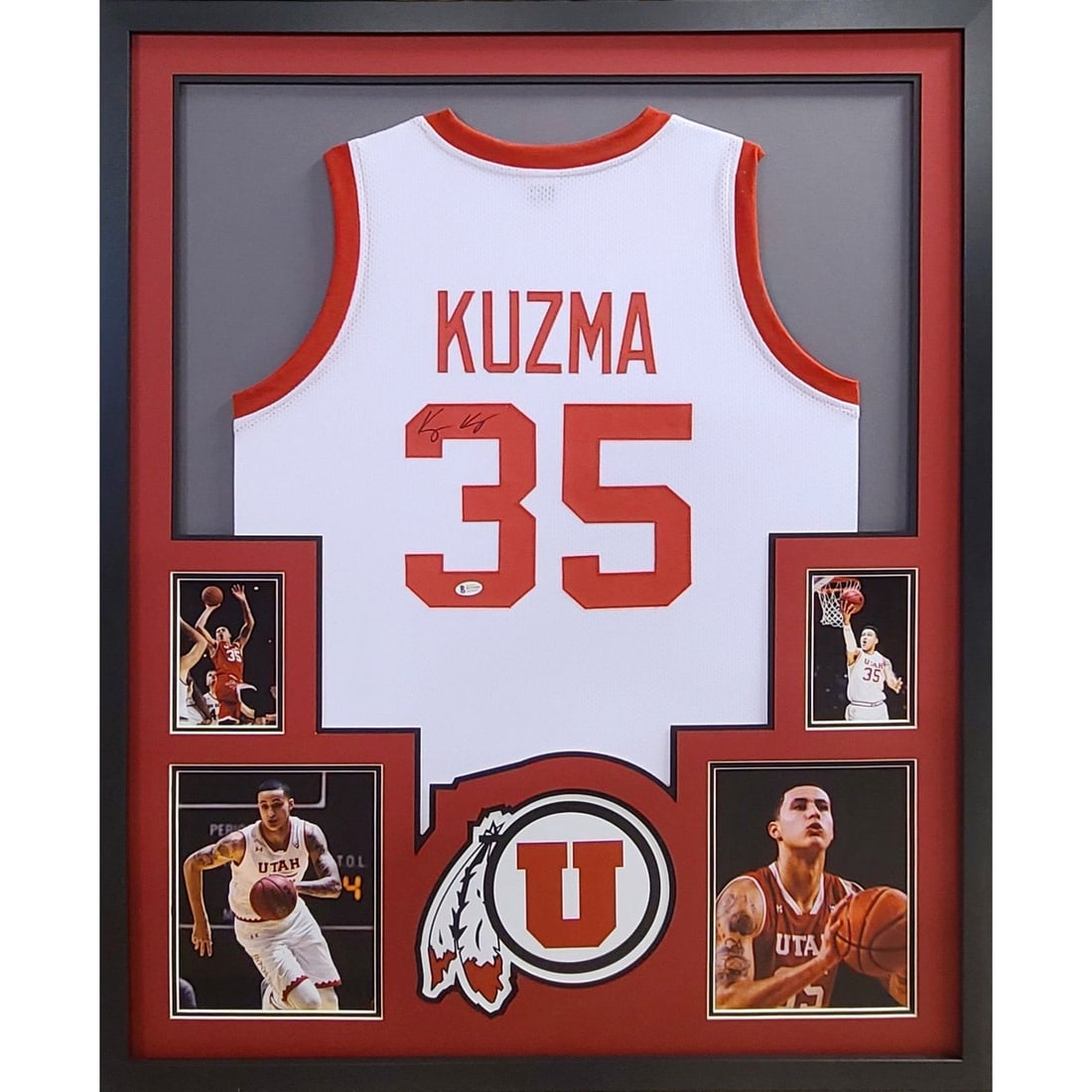Kyle Kuzma Framed Signed Jersey UV Protected Beckett Authenticated: Kyle Kuzma Framed Signed Jersey UV Protected Beckett Authenticated This is an autographed Kyle Kuzma framed jersey featuring the Utah Utes and Los Angeles Lakers. The jersey is authenticated by Becket