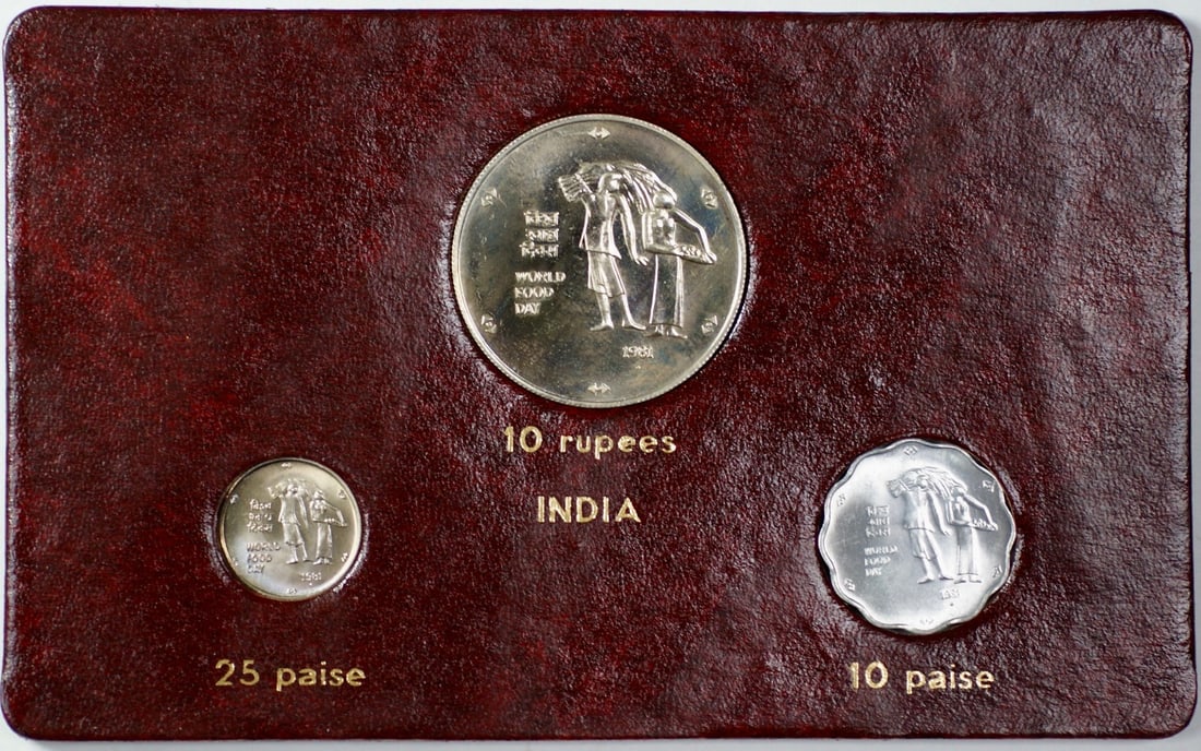 India 1981 FAO World Food Day Album Insert With 10 25 Paise 10 Rupees Coins: India 1981 FAO World Food Day Album Insert With 10 25 Paise 10 Rupees Coins This album insert commemorates the 1981 FAO World Food Day, celebrated on October 16. It includes an uncirculated set of Ind