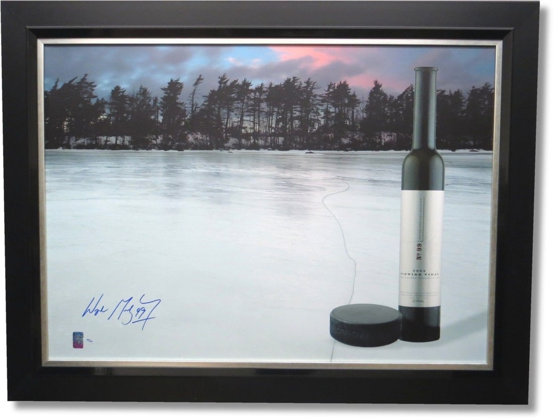 Wayne Gretzky Signed Framed Canvas 27x36 Ice Wine #/26 WGA: Wayne Gretzky Signed Framed Canvas 27x36 Ice Wine #/26 WGA This stunning framed canvas print features a hand-signed autograph from the legendary Wayne Gretzky. Measuring 27 x 36 inches, this limited e