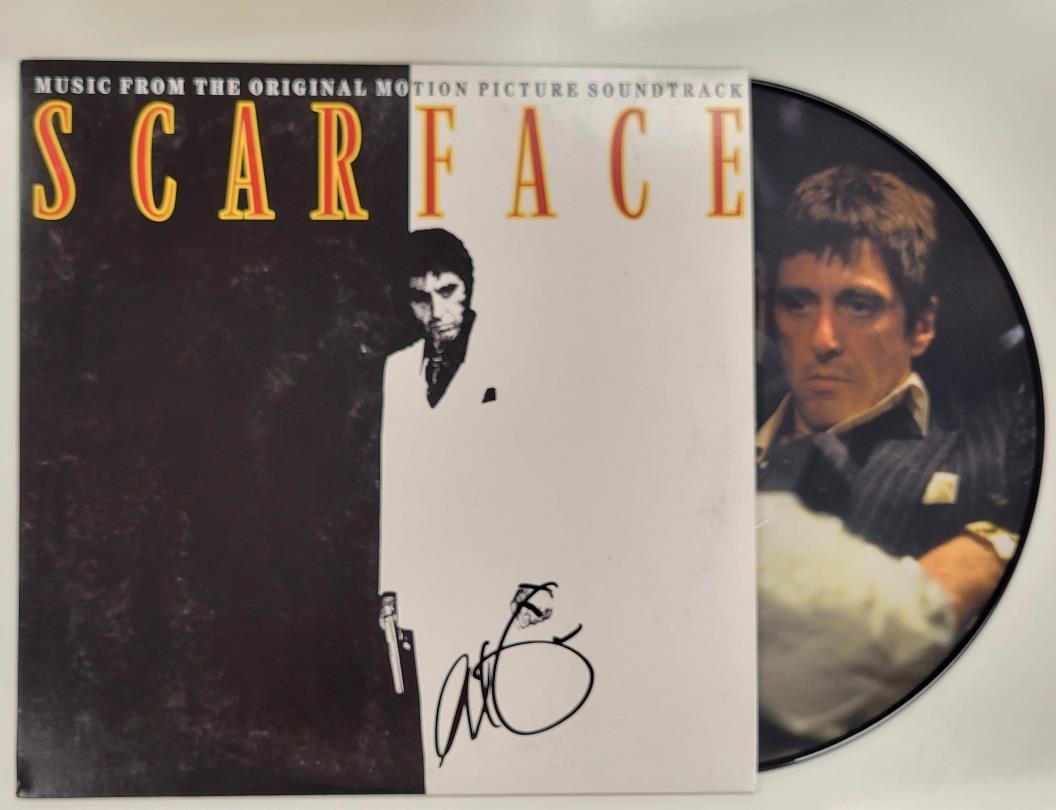 Scarface Laserdisc Cover Signed by Al Pacino Beckett Authenticated Autograph: Scarface Laserdisc Cover Signed by Al Pacino Beckett Authenticated Autograph This is an original Scarface Laserdisc cover autographed by Al Pacino. The autograph has been authenticated by Beckett and
