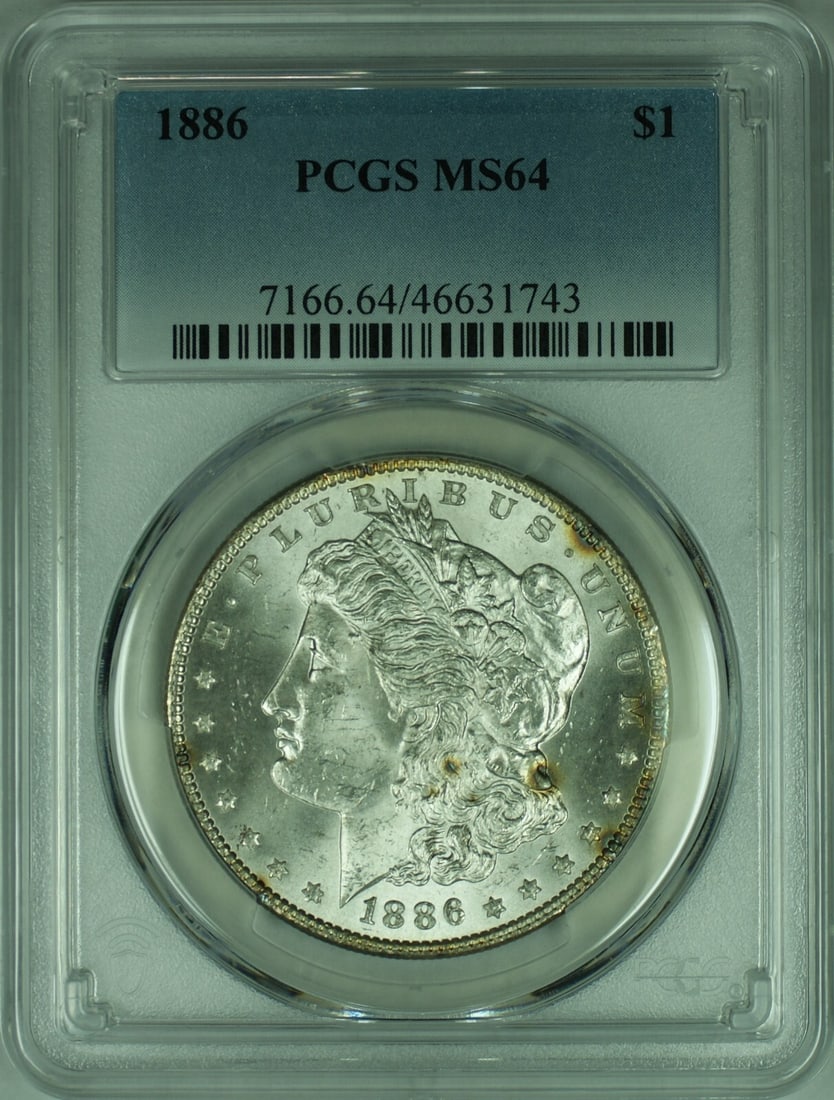 PCGS MS64 1886 Silver Morgan Dollar Philadelphia Mint Certified Coin: PCGS MS64 1886 Silver Morgan Dollar Philadelphia Mint Certified Coin This 1886 Morgan Silver Dollar is certified by PCGS with a grade of MS-64. Struck in Philadelphia, it features a silver composition