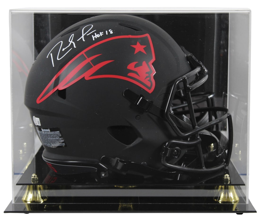 Randy Moss Signed Patriots Eclipse Helmet HOF 18 BAS Witnessed: Randy Moss Signed Patriots Eclipse Helmet HOF 18 BAS Witnessed This full-size Riddell Speed Proline helmet features a striking alternate Eclipse design, personally signed by NFL Hall of Famer Randy Mo