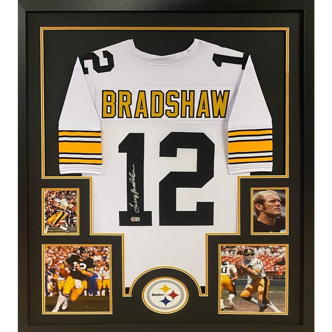 Terry Bradshaw Signed Framed WHT Jersey Beckett Authenticated Pittsburgh Steelers: Terry Bradshaw Signed Framed WHT Jersey Beckett Authenticated Pittsburgh Steelers Celebrate the legacy of Terry Bradshaw with this exquisite framed autographed jersey. This Pittsburgh Steelers jersey