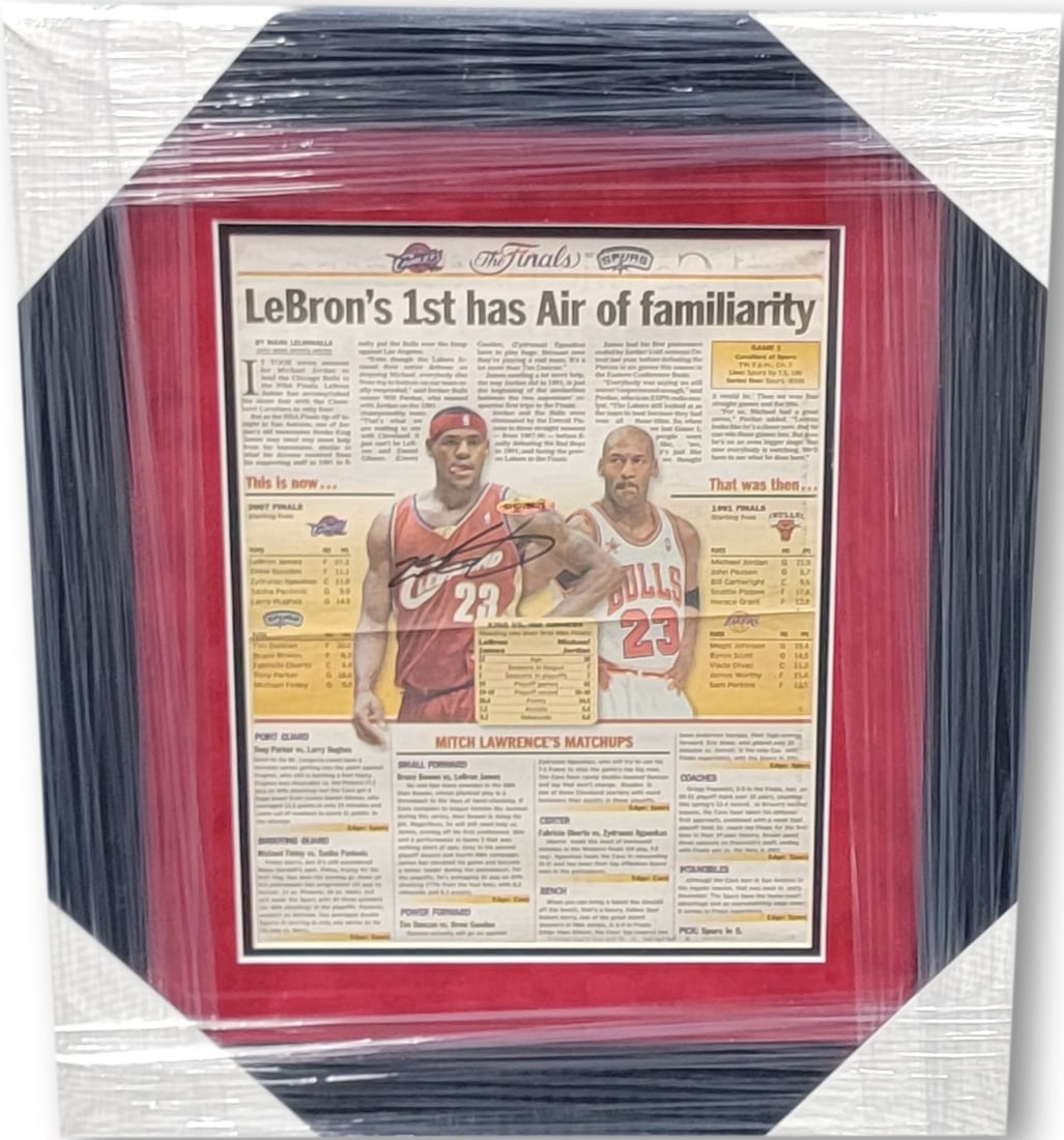 LeBron James Hand Signed Custom Framed Newspaper 18x21 Upper Deck Authenticated: LeBron James Hand Signed Custom Framed Newspaper 18x21 Upper Deck Authenticated This collectible features a hand-signed newspaper by LeBron James, beautifully custom framed to a dimension of 18x21 inc