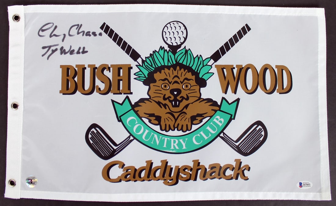 Chevy Chase Signed Caddyshack Flag with Ty Webb Inscription BAS I47053: Chevy Chase Signed Caddyshack Flag with Ty Webb Inscription BAS I47053 This authentic Bushwood Country Club flag features the full name and character inscription "Ty Webb" personally signed by Chevy C