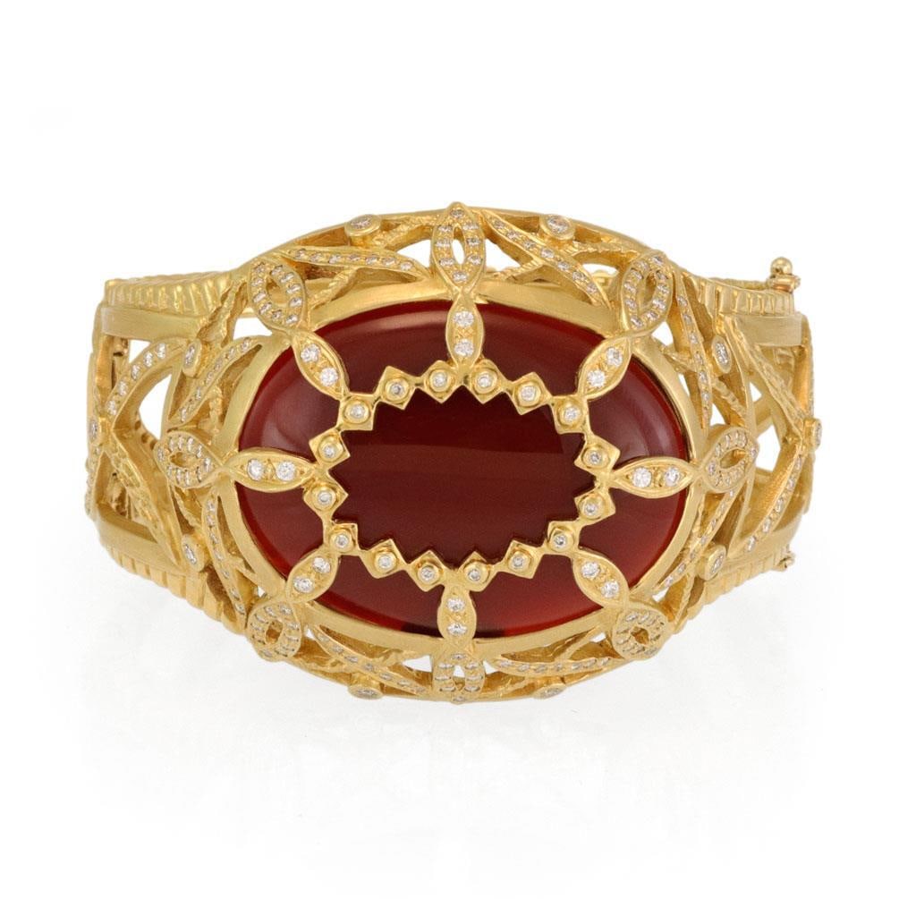 Doris Panos 18k Gold Honey Drop Carnelian Diamond Cage Bracelet: Doris Panos 18k Gold Honey Drop Carnelian Diamond Cage Bracelet Introducing a stunning bracelet from designer Doris Panos, part of the Honey Drop Carnelian Collection. This exquisite piece is crafted