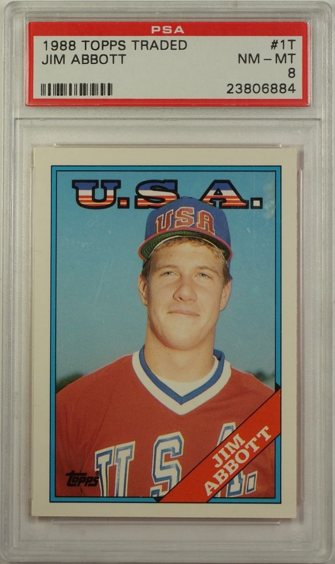 PSA 8 Jim Abbott USA Team 1988 Topps Traded Baseball Card #1T: PSA 8 Jim Abbott USA Team 1988 Topps Traded Baseball Card #1T This is a 1988 Topps Traded Jim Abbott USA National Team baseball card, graded NM-MT 8 by PSA. The card features Jim Abbott as part of the