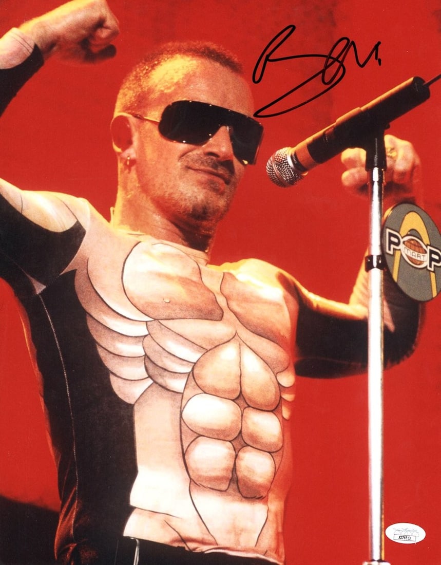 Bono Signed 11x14 Photo U2 Singer JSA Authenticated: Bono Signed 11x14 Photo U2 Singer JSA Authenticated Capture a moment in music history with this authentic 11X14 photograph of Bono, the legendary frontman of U2, performing on stage. This stunning ima