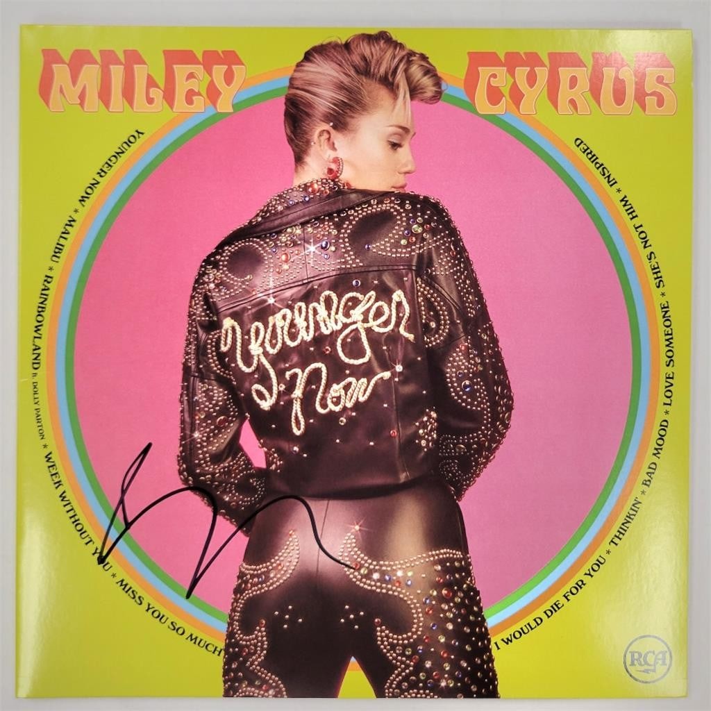 Younger Now vinyl album cover signed by Miley Cyrus with Beckett authentication: Younger Now vinyl album cover signed by Miley Cyrus with Beckett authentication This is an original "Younger Now" vinyl album cover signed by Miley Cyrus. The autograph has been authenticated by Becke