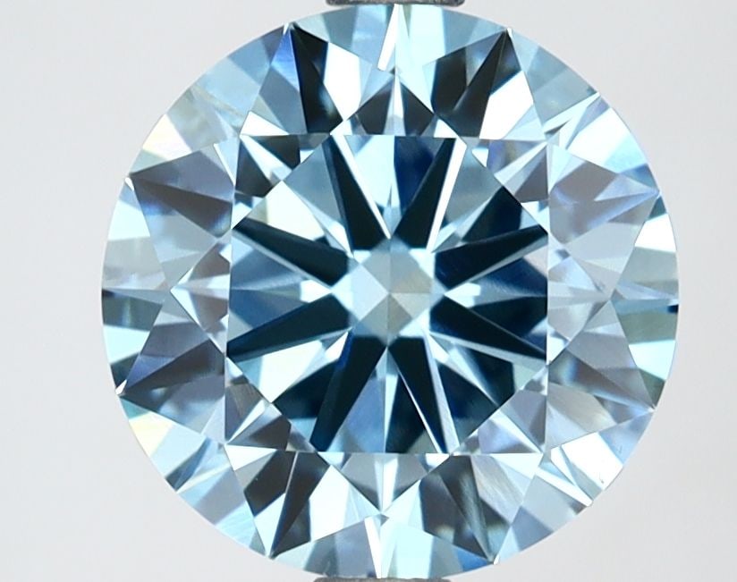 Ideal Loose Diamond - ROUND 2.51ct Fancy Vivid Blue VS1: Ideal Loose Diamond - ROUND 2.51ct Fancy Vivid Blue VS1 Source: This is a real non-mined Diamond that has been grown in a lab Shape: ROUND Carats: 2.51 Color: Fancy Vivid Blue Certification: IGI Video