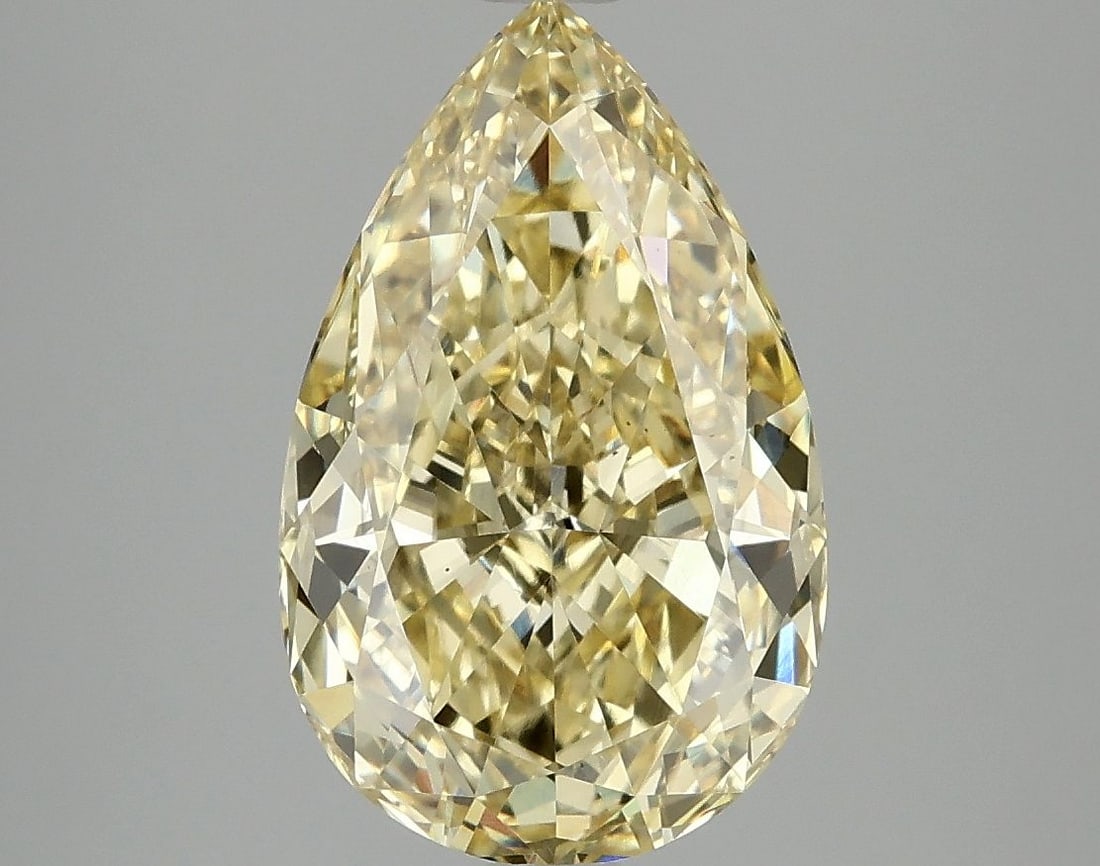 Loose Diamond - PEAR 4.06ct Fancy Vivid Yellow VS2: Loose Diamond - PEAR 4.06ct Fancy Vivid Yellow VS2 Source: This is a real non-mined Diamond that has been grown in a lab Shape: PEAR Carats: 4.06 Color: Fancy Vivid Yellow Certification: IGI Video: