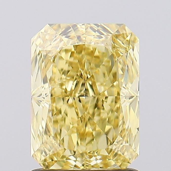 Loose Diamond - RADIANT 1.54ct Fancy Vivid Yellow VS2: Loose Diamond - RADIANT 1.54ct Fancy Vivid Yellow VS2 Source: This is a real non-mined Diamond that has been grown in a lab Shape: RADIANT Carats: 1.54 Color: Fancy Vivid Yellow Certification: IGI Vid