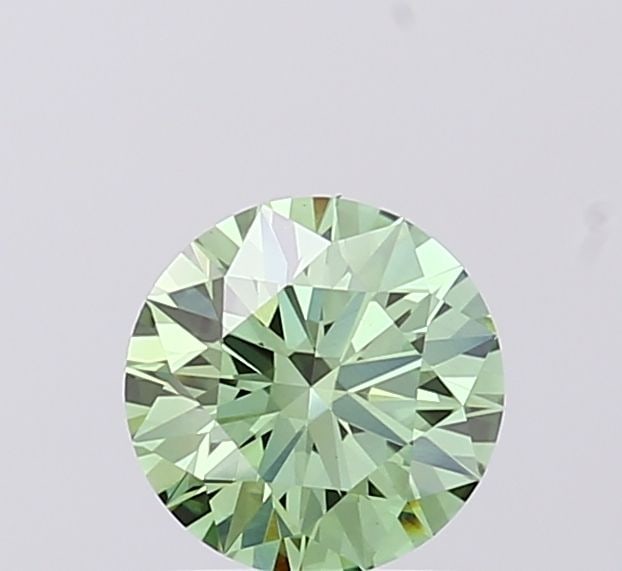 Ideal Loose Diamond - ROUND 1.04ct Fancy Vivid Green VS1: Ideal Loose Diamond - ROUND 1.04ct Fancy Vivid Green VS1 Source: This is a real non-mined Diamond that has been grown in a lab Shape: ROUND Carats: 1.04 Color: Fancy Vivid Green Certification: IGI Vid