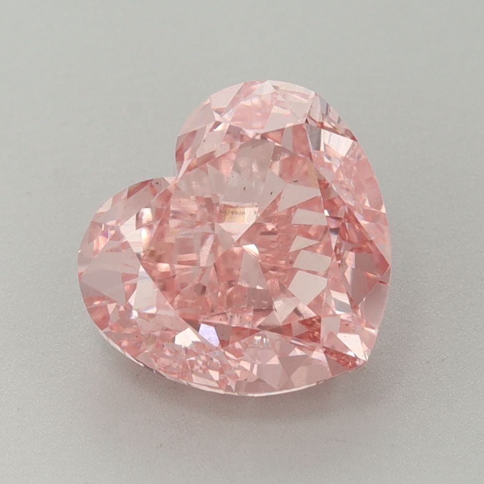 Loose Diamond - HEART 3.53ct Fancy Vivid Pink VS2: Loose Diamond - HEART 3.53ct Fancy Vivid Pink VS2 Source: This is a real non-mined Diamond that has been grown in a lab Shape: HEART Carats: 3.53 Color: Fancy Vivid Pink Certification: IGI Video: