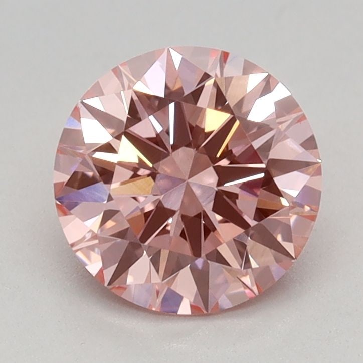 Ideal Loose Diamond - ROUND 0.94ct Fancy Intense Pink VVS2: Ideal Loose Diamond - ROUND 0.94ct Fancy Intense Pink VVS2 Source: This is a real non-mined Diamond that has been grown in a lab Shape: ROUND Carats: 0.94 Color: Fancy Intense Pink Certification: IGI