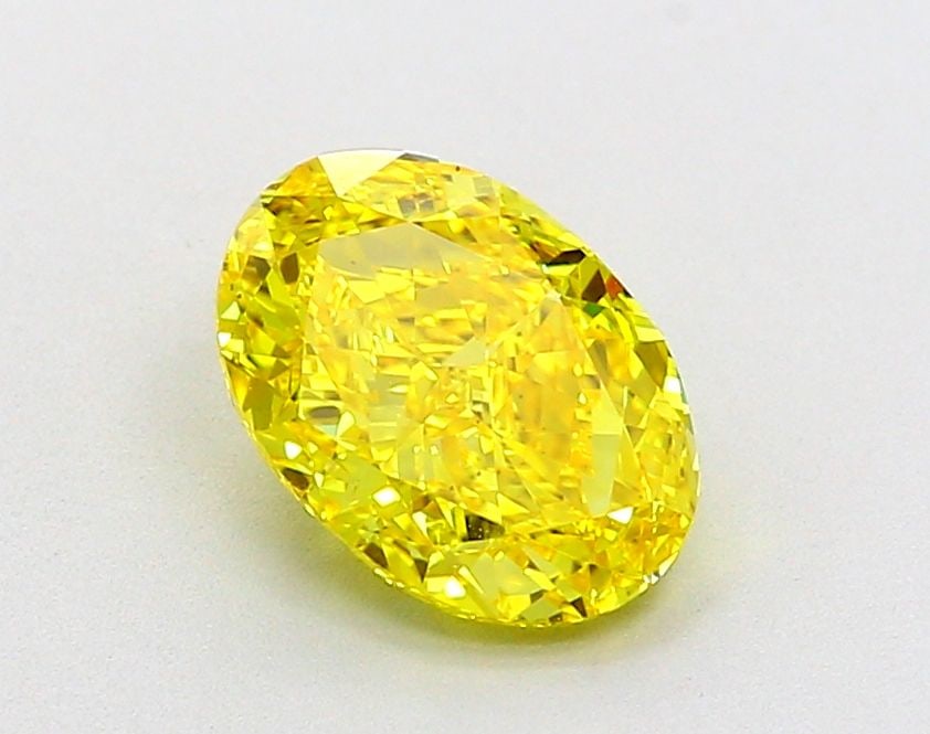 Loose Diamond - OVAL 2.04ct Fancy Vivid Yellow VVS2: Loose Diamond - OVAL 2.04ct Fancy Vivid Yellow VVS2 Source: This is a real non-mined Diamond that has been grown in a lab Shape: OVAL Carats: 2.04 Color: Fancy Vivid Yellow Certification: IGI Video: