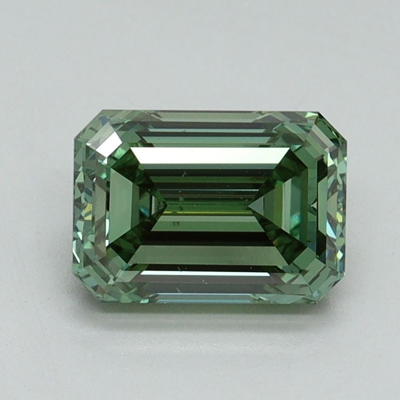 Loose Diamond - EMERALD 1.47ct Fancy Vivid Green VS2: Loose Diamond - EMERALD 1.47ct Fancy Vivid Green VS2 Source: This is a real non-mined Diamond that has been grown in a lab Shape: EMERALD Carats: 1.47 Color: Fancy Vivid Green Certification: IGI Video