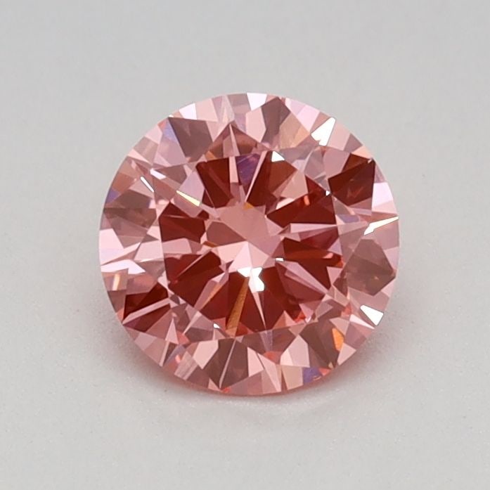Loose Diamond - ROUND 0.47ct Fancy Vivid Pink VVS2: Loose Diamond - ROUND 0.47ct Fancy Vivid Pink VVS2 Source: This is a real non-mined Diamond that has been grown in a lab Shape: ROUND Carats: 0.47 Color: Fancy Vivid Pink Certification: IGI Video: