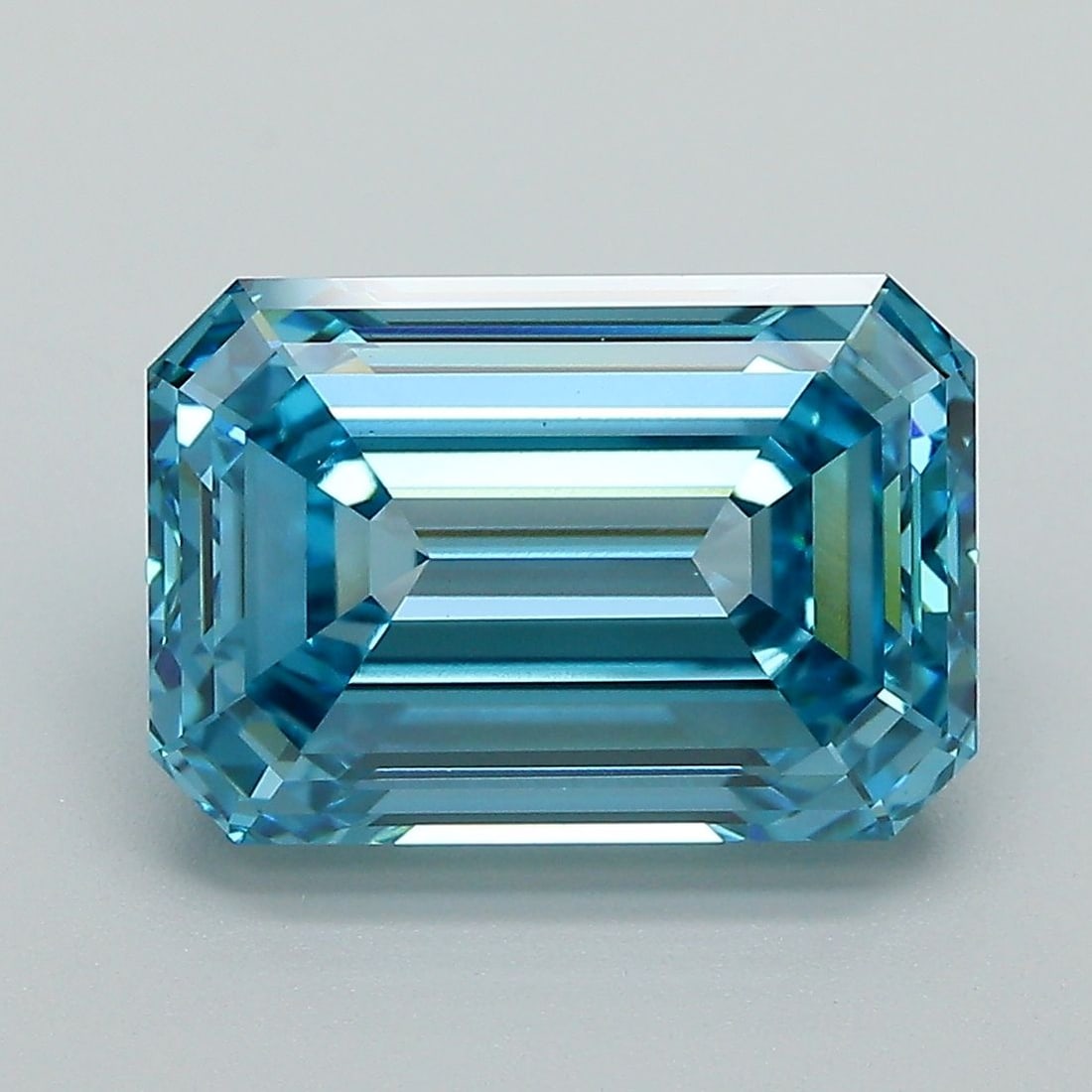 Loose Diamond - EMERALD 5.1ct Fancy Vivid Blue VS1: Loose Diamond - EMERALD 5.1ct Fancy Vivid Blue VS1 Source: This is a real non-mined Diamond that has been grown in a lab Shape: EMERALD Carats: 5.1 Color: Fancy Vivid Blue Certification: IGI Video: