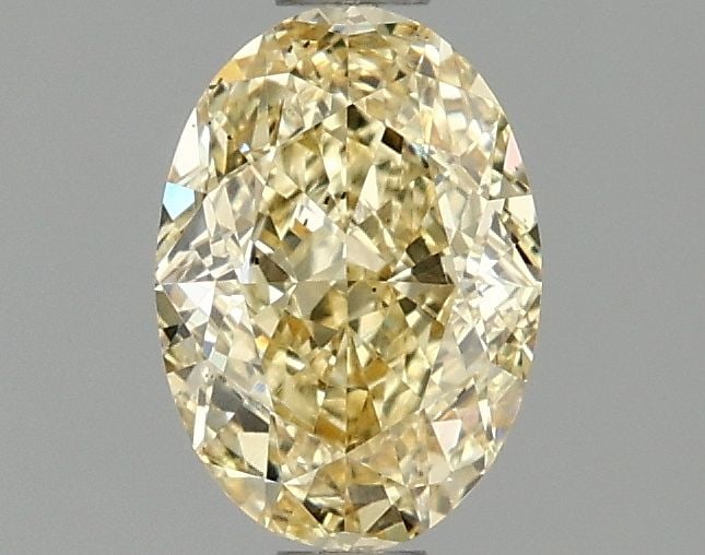 Loose Diamond - OVAL 1.09ct Fancy Intense Yellow VS2: Loose Diamond - OVAL 1.09ct Fancy Intense Yellow VS2 Source: This is a real non-mined Diamond that has been grown in a lab Shape: OVAL Carats: 1.09 Color: Fancy Intense Yellow Certification: IGI Video