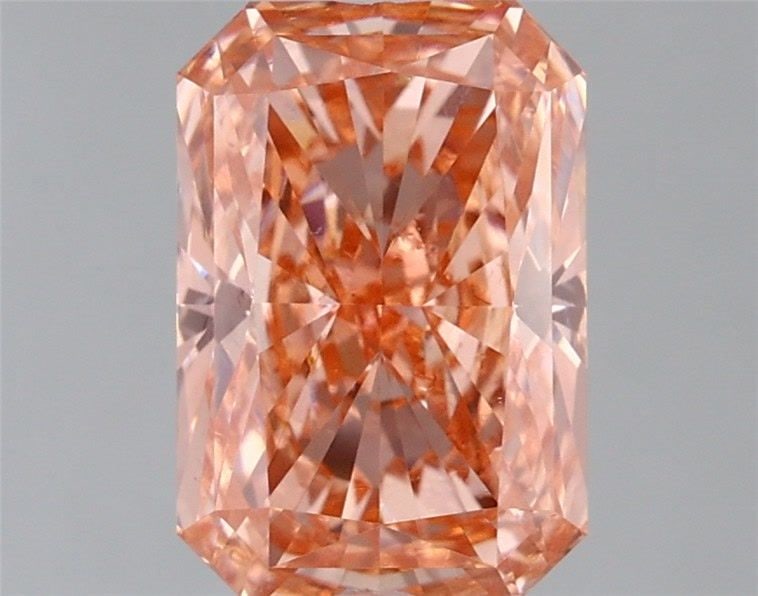 Loose Diamond - RADIANT 2.1ct Fancy Vivid Orangey Pink VVS2: Loose Diamond - RADIANT 2.1ct Fancy Vivid Orangey Pink VVS2 Source: This is a real non-mined Diamond that has been grown in a lab Shape: RADIANT Carats: 2.1 Color: Fancy Vivid Orangey Pink Certificati