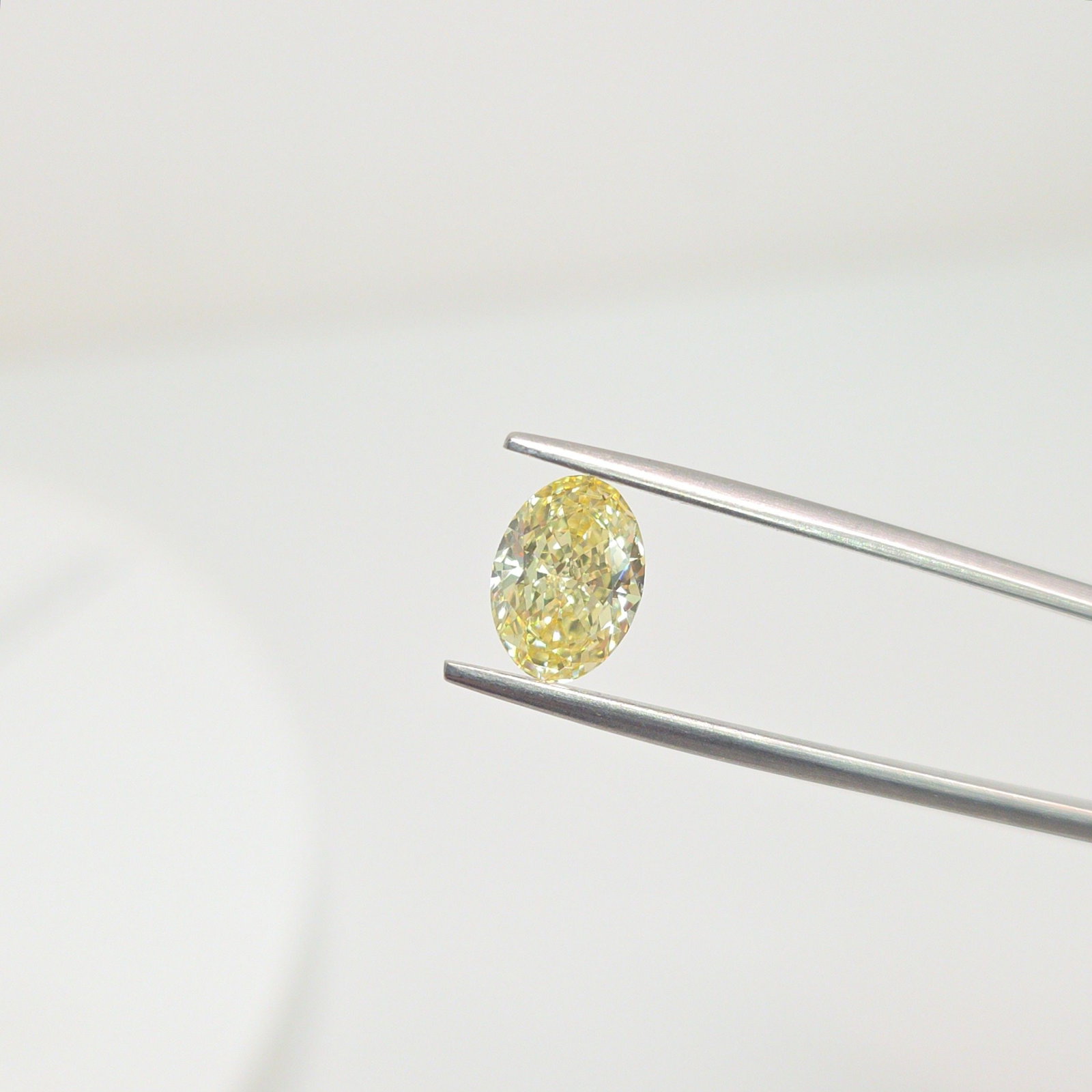 Loose Diamond - OVAL 1.96ct Fancy Yellow VVS2: Loose Diamond - OVAL 1.96ct Fancy Yellow VVS2 Source: This is a real non-mined Diamond that has been grown in a lab Shape: OVAL Carats: 1.96 Color: Fancy Yellow Certification: IGI Video: