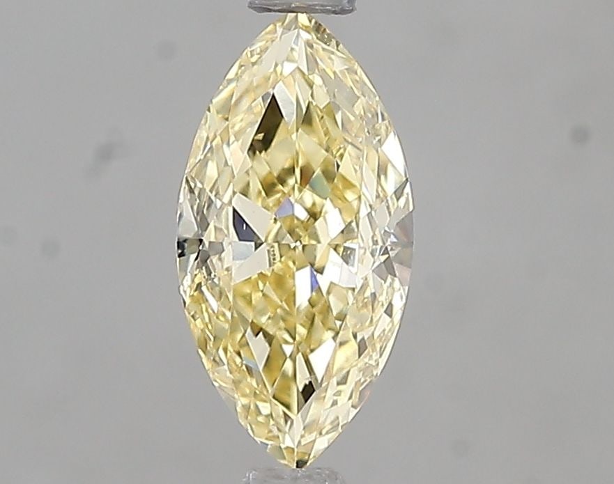 Loose Diamond - MARQUISE 1.0ct Fancy Intense Yellow VS2: Loose Diamond - MARQUISE 1.0ct Fancy Intense Yellow VS2 Source: This is a real non-mined Diamond that has been grown in a lab Shape: MARQUISE Carats: 1.0 Color: Fancy Intense Yellow Certification: IGI