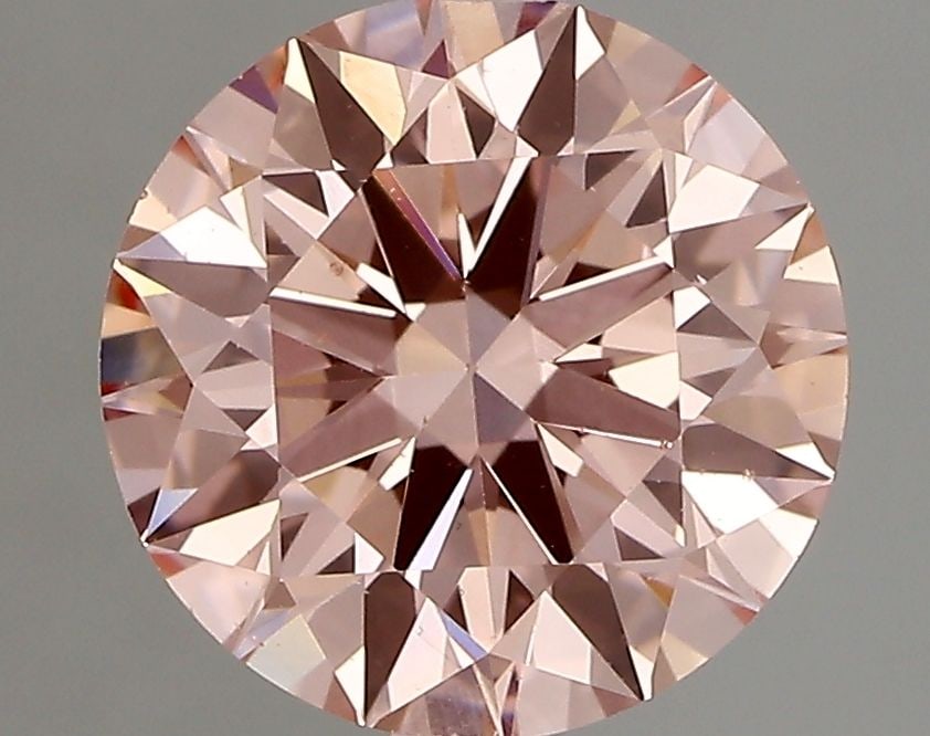Loose Diamond - ROUND 1.54ct Fancy Vivid Pink VS1: Loose Diamond - ROUND 1.54ct Fancy Vivid Pink VS1 Source: This is a real non-mined Diamond that has been grown in a lab Shape: ROUND Carats: 1.54 Color: Fancy Vivid Pink Certification: IGI Video: