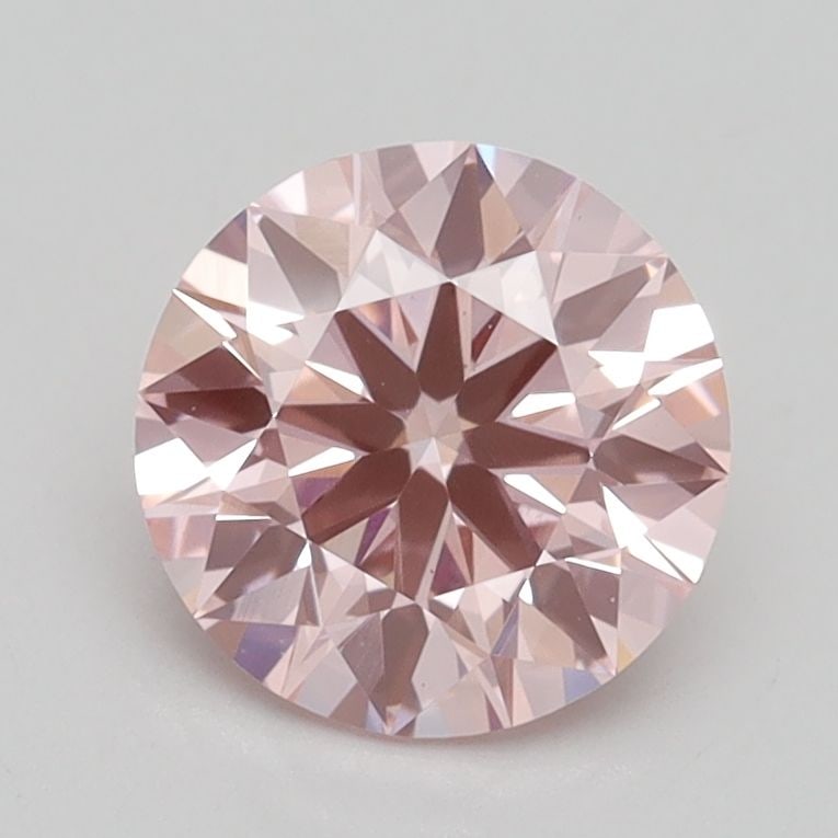 Ideal Loose Diamond - ROUND 1.41ct Fancy Vivid Pink VS1: Ideal Loose Diamond - ROUND 1.41ct Fancy Vivid Pink VS1 Source: This is a real non-mined Diamond that has been grown in a lab Shape: ROUND Carats: 1.41 Color: Fancy Vivid Pink Certification: IGI Video