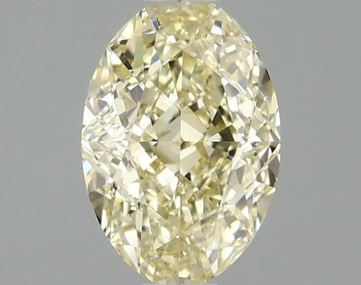 Loose Diamond - OVAL 1.52ct Fancy Yellow VS1: Loose Diamond - OVAL 1.52ct Fancy Yellow VS1 Source: This is a real non-mined Diamond that has been grown in a lab Shape: OVAL Carats: 1.52 Color: Fancy Yellow Certification: IGI Video: