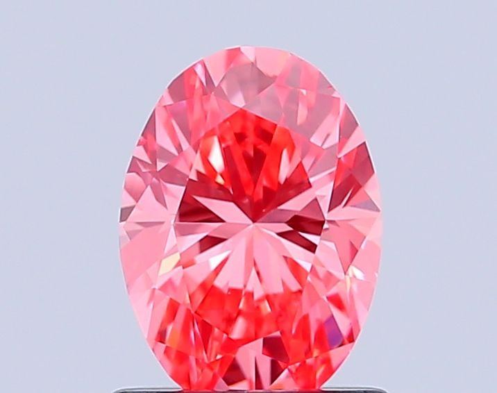 Loose Diamond - OVAL 0.96ct Fancy Vivid Pink VS2: Loose Diamond - OVAL 0.96ct Fancy Vivid Pink VS2 Source: This is a real non-mined Diamond that has been grown in a lab Shape: OVAL Carats: 0.96 Color: Fancy Vivid Pink Certification: IGI Video: