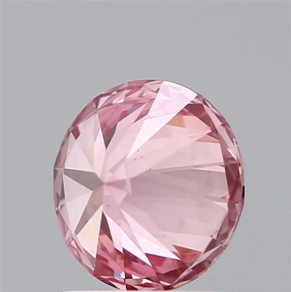 Loose Diamond - ROUND 1.36ct Fancy Vivid Pink VS2: Loose Diamond - ROUND 1.36ct Fancy Vivid Pink VS2 Source: This is a real non-mined Diamond that has been grown in a lab Shape: ROUND Carats: 1.36 Color: Fancy Vivid Pink Certification: IGI Video: