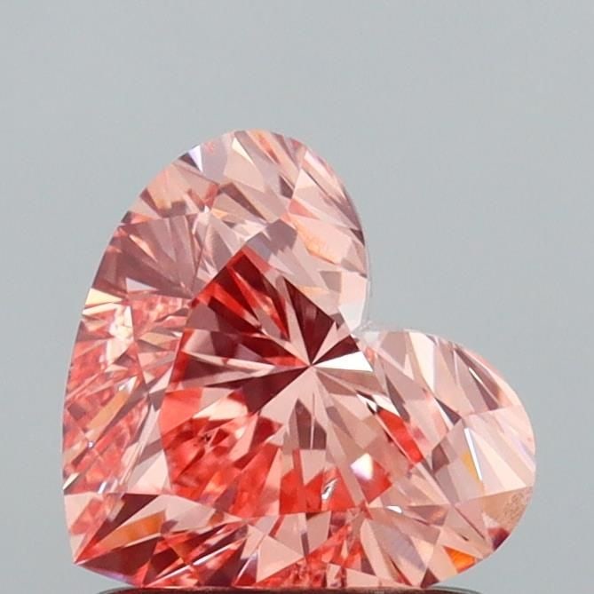Loose Diamond - HEART 1.01ct Fancy Intense Pinkish Orange SI1: Loose Diamond - HEART 1.01ct Fancy Intense Pinkish Orange SI1 Source: This is a real non-mined Diamond that has been grown in a lab Shape: HEART Carats: 1.01 Color: Fancy Intense Pinkish Orange Certif