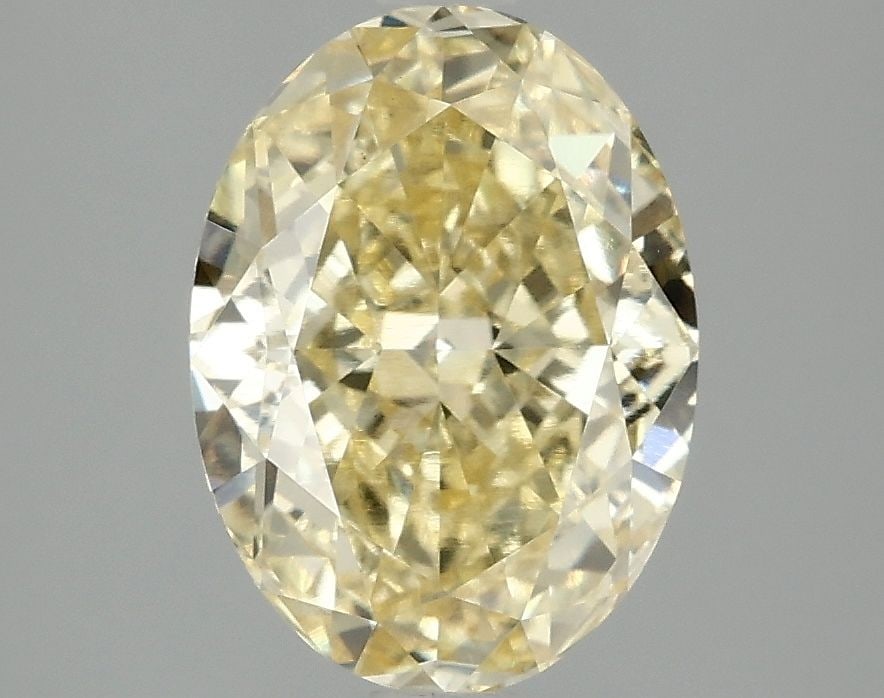 Loose Diamond - OVAL 3.1ct Fancy Vivid Yellow VS1: Loose Diamond - OVAL 3.1ct Fancy Vivid Yellow VS1 Source: This is a real non-mined Diamond that has been grown in a lab Shape: OVAL Carats: 3.1 Color: Fancy Vivid Yellow Certification: IGI Video: