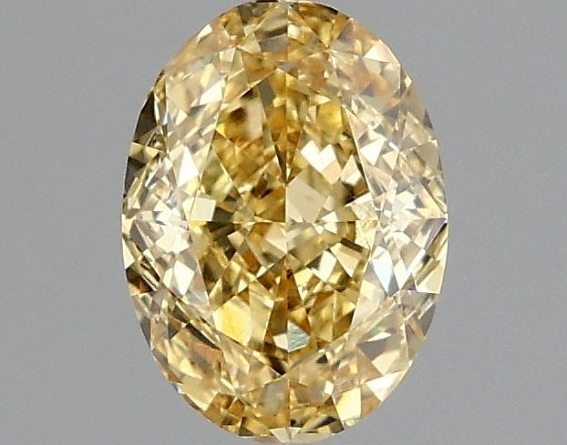 Loose Diamond - OVAL 1.09ct Fancy Vivid Yellow VS1: Loose Diamond - OVAL 1.09ct Fancy Vivid Yellow VS1 Source: This is a real non-mined Diamond that has been grown in a lab Shape: OVAL Carats: 1.09 Color: Fancy Vivid Yellow Certification: IGI Video:
