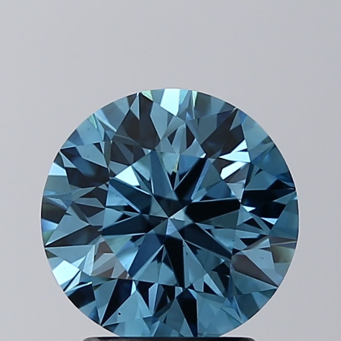 Ideal Loose Diamond - ROUND 2.12ct Fancy Vivid Blue VS2: Ideal Loose Diamond - ROUND 2.12ct Fancy Vivid Blue VS2 Source: This is a real non-mined Diamond that has been grown in a lab Shape: ROUND Carats: 2.12 Color: Fancy Vivid Blue Certification: IGI Video