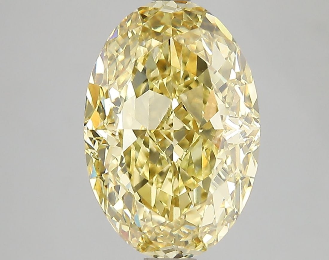 Loose Diamond - OVAL 5.0ct Fancy Vivid Yellow VS1: Loose Diamond - OVAL 5.0ct Fancy Vivid Yellow VS1 Source: This is a real non-mined Diamond that has been grown in a lab Shape: OVAL Carats: 5.0 Color: Fancy Vivid Yellow Certification: IGI Video: