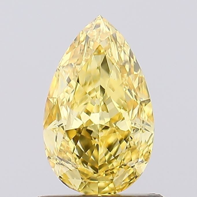Loose Diamond - PEAR 1.08ct Fancy Vivid Yellow VS1: Loose Diamond - PEAR 1.08ct Fancy Vivid Yellow VS1 Source: This is a real non-mined Diamond that has been grown in a lab Shape: PEAR Carats: 1.08 Color: Fancy Vivid Yellow Certification: IGI Video: